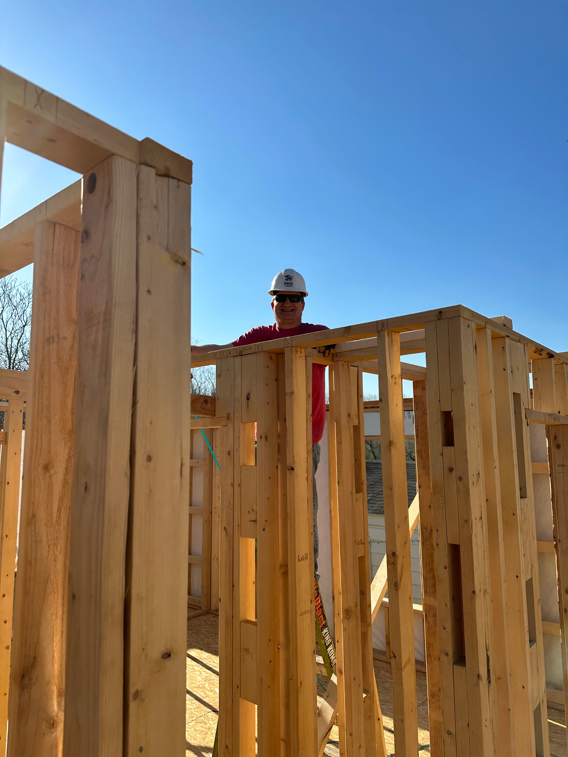 Kevin helping to frame a Habitat for Humanity house.